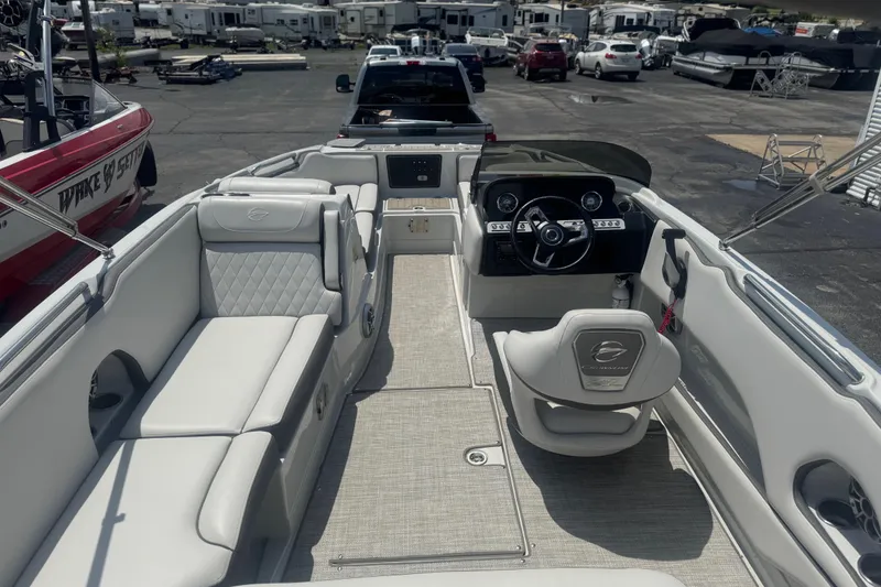 Slide: The Image of 2022 Crownline Eclipse E205 XS Fish boat interior with plush seating and modern dashboard. - 6
