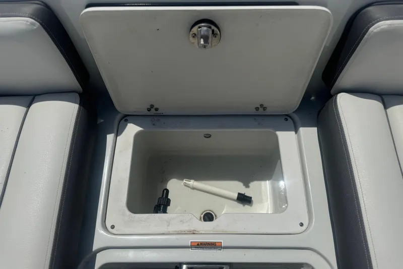Slide: The Image of Open storage compartment on 2022 Crownline Eclipse E205 XS Fish boat. - 9