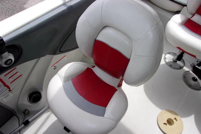 Slide: The Image of White and red boat seat in a 2013 Nitro 290 Sport. - 6