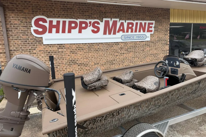 Slide: The Image of 2026 Xpress XP170 boat with Yamaha motor at Shipp's Marine dealership. - 2