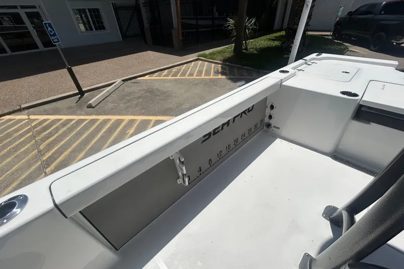 Slide: The Image of 2026 Sea Pro 250 Bay boat interior, featuring sleek design and spacious seating area. - 21