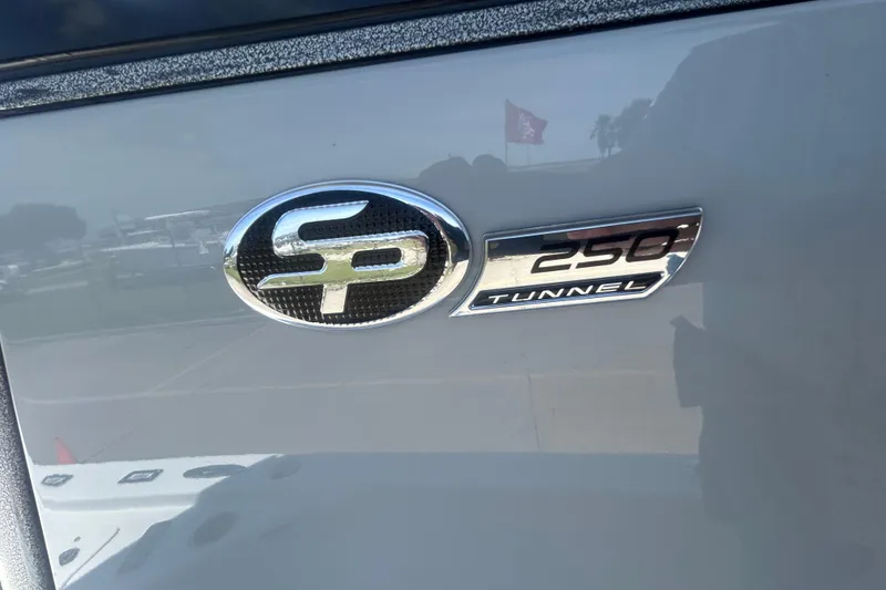 Slide: The Image of Sea Pro 250 Bay 2026 emblem on boat exterior. - 26