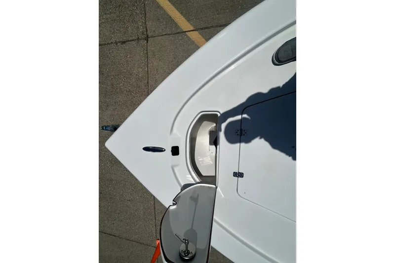 Slide: The Image of Top view of 2026 Sea Pro 250 Bay boat deck with open hatch. - 6