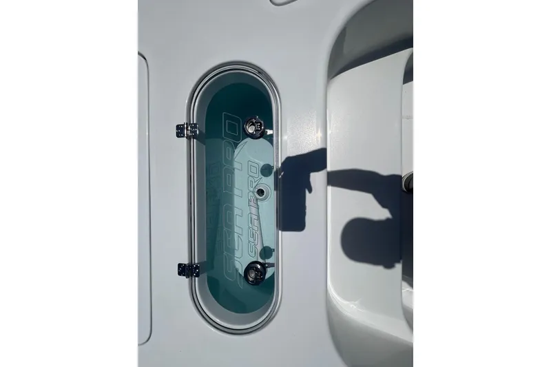 Slide: The Image of Sea Pro 250 Bay 2026 boat compartment with shadow on white surface. - 7