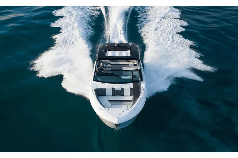 Slide: The Image of 2027 Cruisers Yachts 38GLS-OB on open water, aerial view. - 20