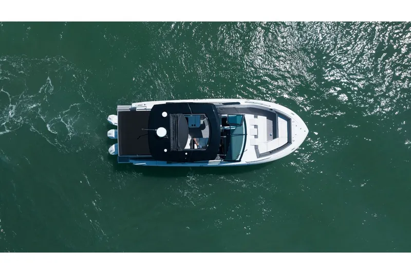 Slide: The Image of Aerial view of 2027 Cruisers Yachts 38GLS-OB on the water. - 27