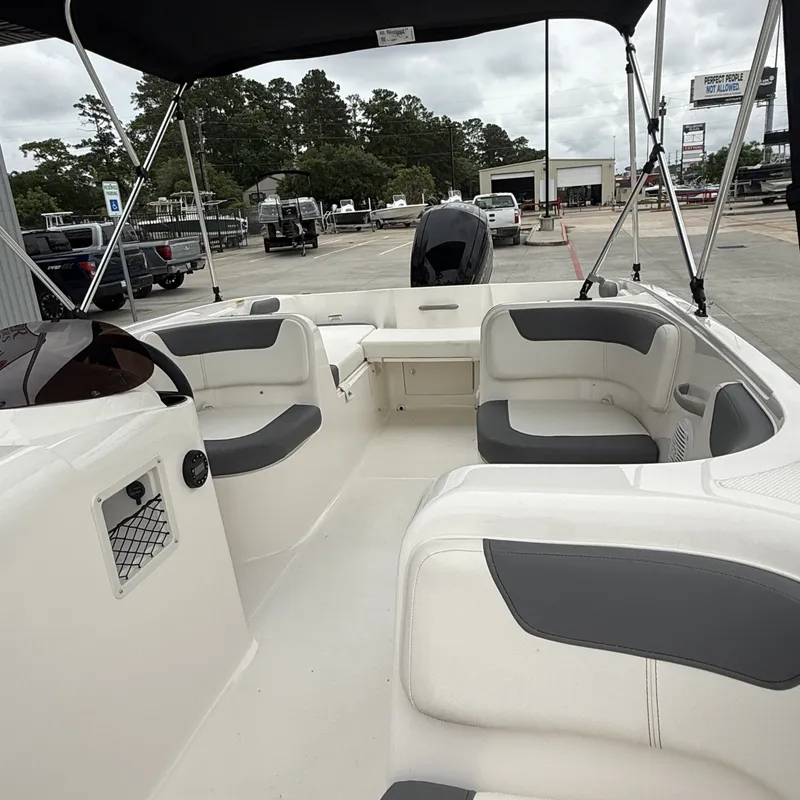 Slide: The Image of Interior of 2025 Bayliner E18LE with gray seating. - 13