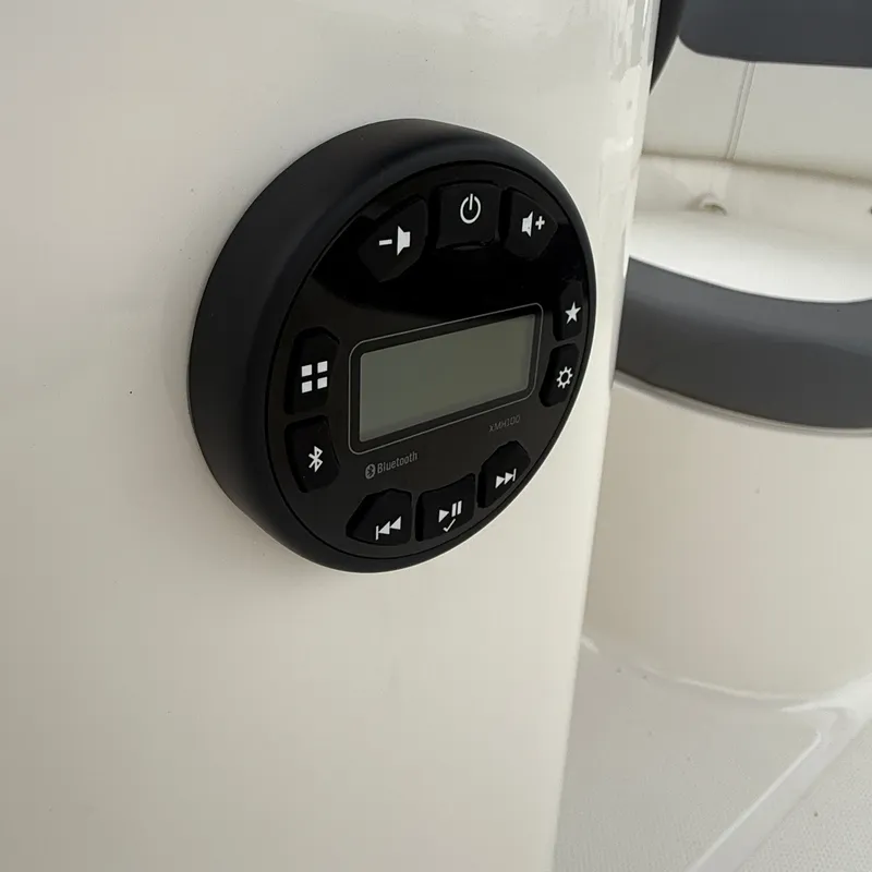 Slide: The Image of 2025 Bayliner E18LE boat control panel with Bluetooth feature. - 15