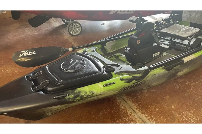 Slide: The Image of Jackson KNARR 2022 kayak with Hobie paddle on concrete floor. - 3