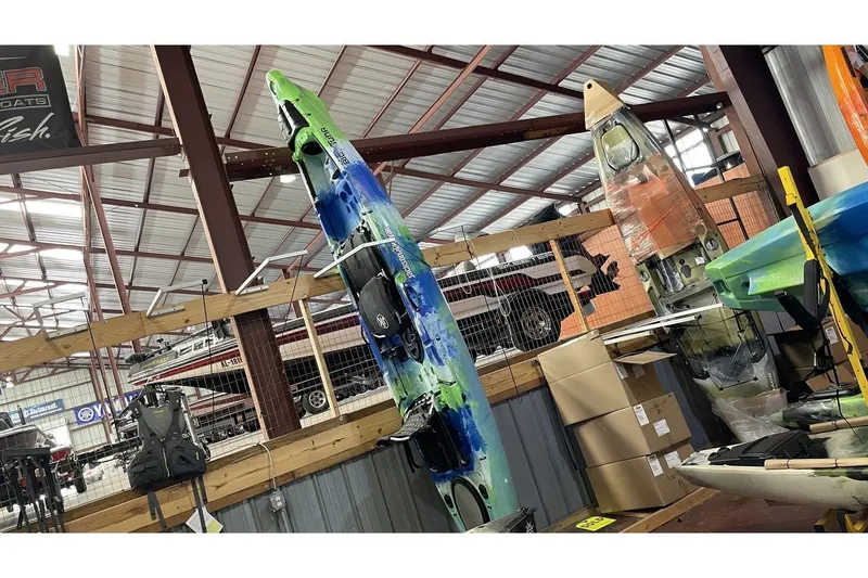 Slide: The Image of Jackson Big Tuna kayak 2021 displayed in warehouse. - 3
