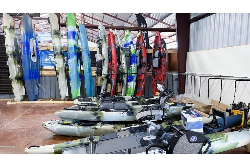 Slide: The Image of Jackson Big Tuna kayaks in a warehouse, Earth model, year 2021. - 5