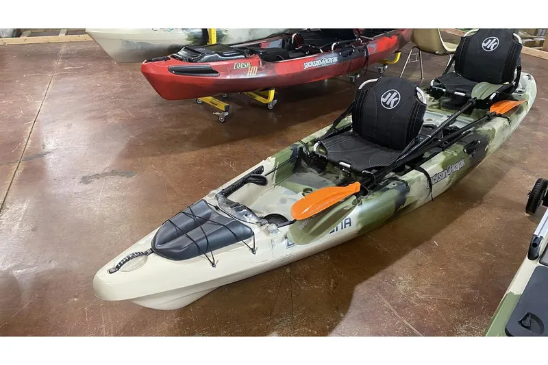 The Image of Jackson Big Tuna kayak 2021 in forest camo on display floor. - 1