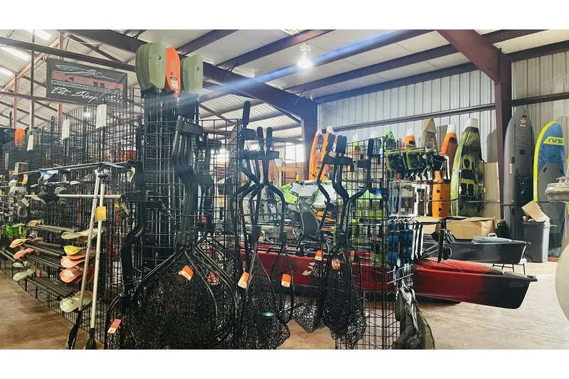 Slide: The Image of Fishing store with Jackson Blue Sky 360 Angler kayaks and gear. - 5