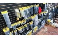 Slide: The Image of Jackson Take Two - Rad 2023 accessories displayed on a wall. - 4