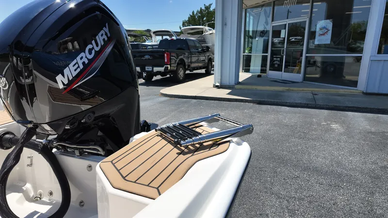 Slide: The Image of The image shows the stern of a 2027 Boston Whaler 160 Super Sport with a Mercury engine. - 4