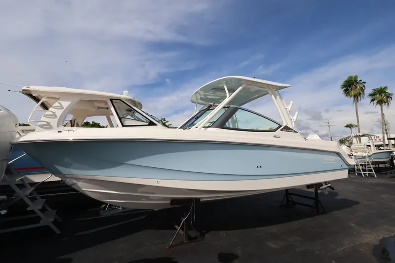 Slide: The Image of Boston Whaler 240 Vantage 2027: Sleek design, light blue and white paint, spacious deck, ideal for leisure. - 1