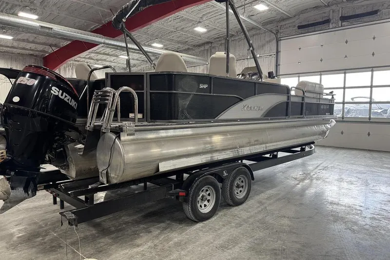 Slide: The Image of 2016 Manitou 24 Aurora LE Angler pontoon boat with Suzuki 250 engine on trailer. - 4