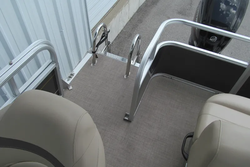 Slide: The Image of 2023 Sun Tracker Party Barge 18 DLX deck with seating and railing. - 10