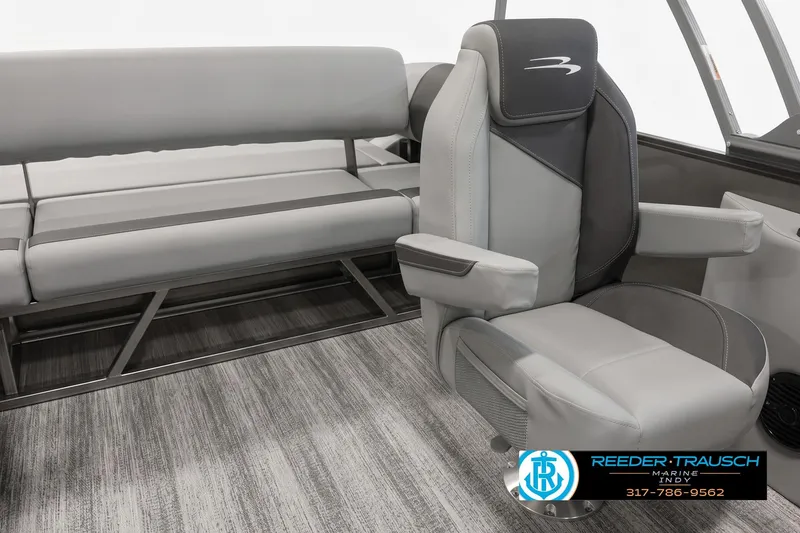 Slide: The Image of 2026 Bennington 22 SSB boat interior with gray seating and modern design. - 4