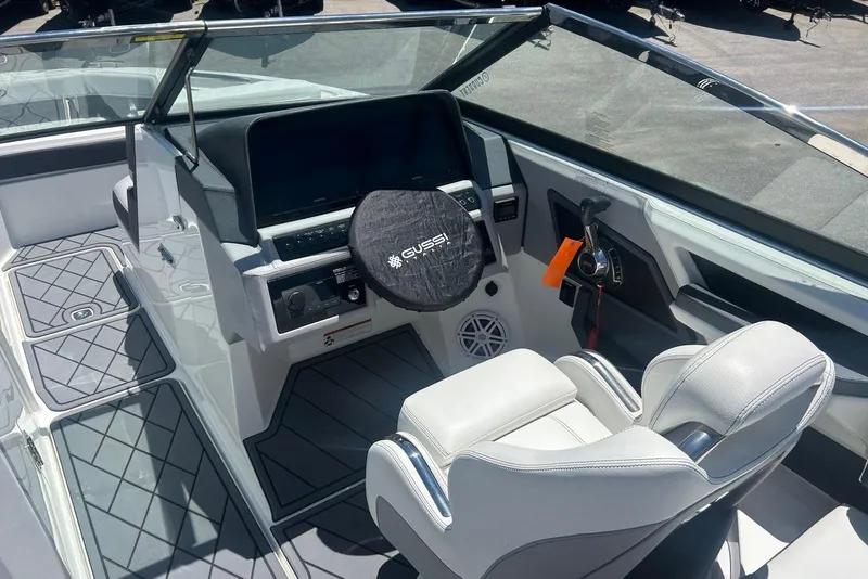 Slide: The Image of 2021 Cobalt R6 boat cockpit with steering wheel and modern dashboard controls. - 3