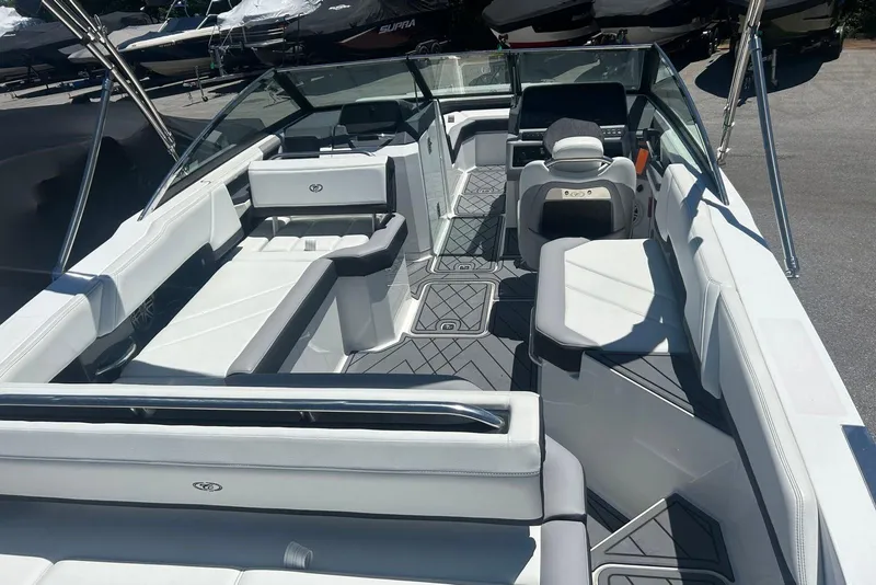 Slide: The Image of 2021 Cobalt R6 boat interior with sleek seating and modern dashboard design. - 5