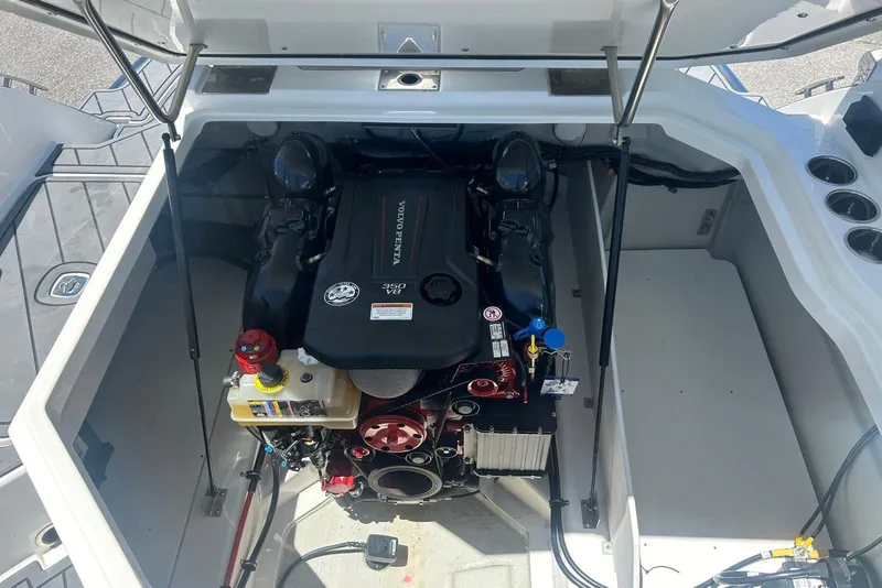 Slide: The Image of Engine compartment of a 2021 Cobalt R6 boat featuring a Volvo Penta 350 V8 engine. - 6