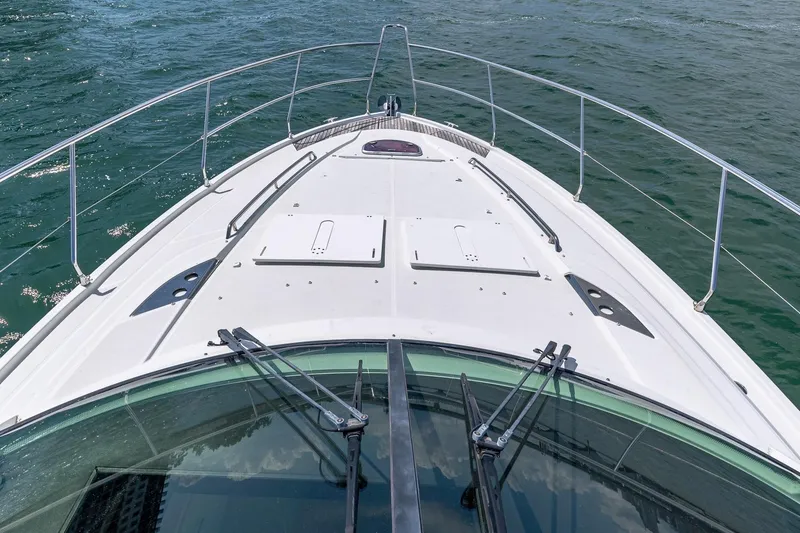 Slide: The Image of Bow view of 2011 Beneteau Gran Turismo 49 Fly yacht on open water. - 10
