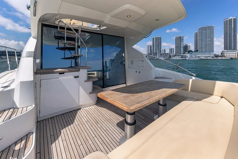 Slide: The Image of Luxurious Beneteau Gran Turismo 49 Fly yacht deck with city skyline view, 2011 model. - 11