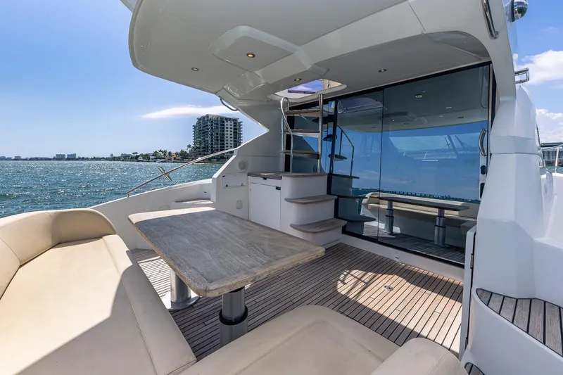 Slide: The Image of Luxurious 2011 Beneteau Gran Turismo 49 Fly yacht with spacious deck and scenic ocean view. - 12