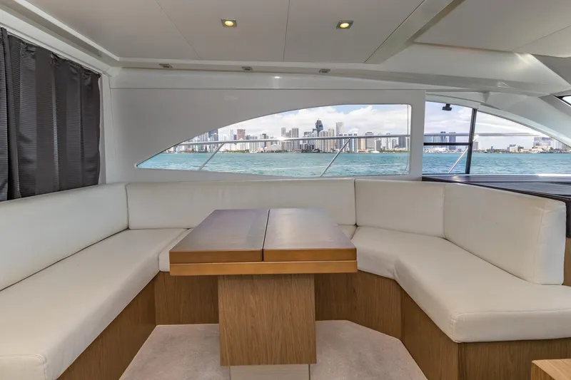 Slide: The Image of Interior of 2011 Beneteau Gran Turismo 49 Fly yacht with city skyline view. - 23