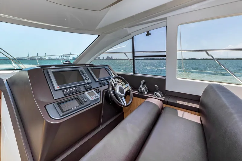 Slide: The Image of Interior helm of 2011 Beneteau Gran Turismo 49 Fly yacht with ocean view. - 25