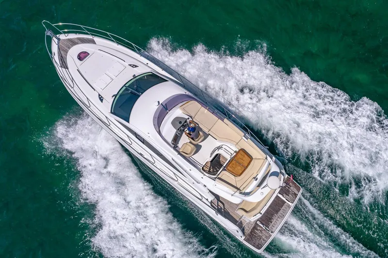 Slide: The Image of Aerial view of 2011 Beneteau Gran Turismo 49 Fly yacht cruising on turquoise water. - 3