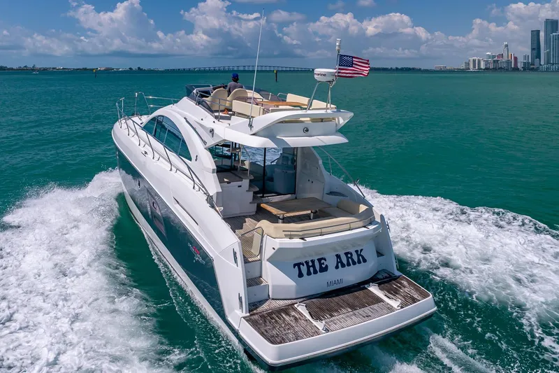 Slide: The Image of Beneteau Gran Turismo 49 Fly yacht cruising in Miami waters, 2011 model. - 4