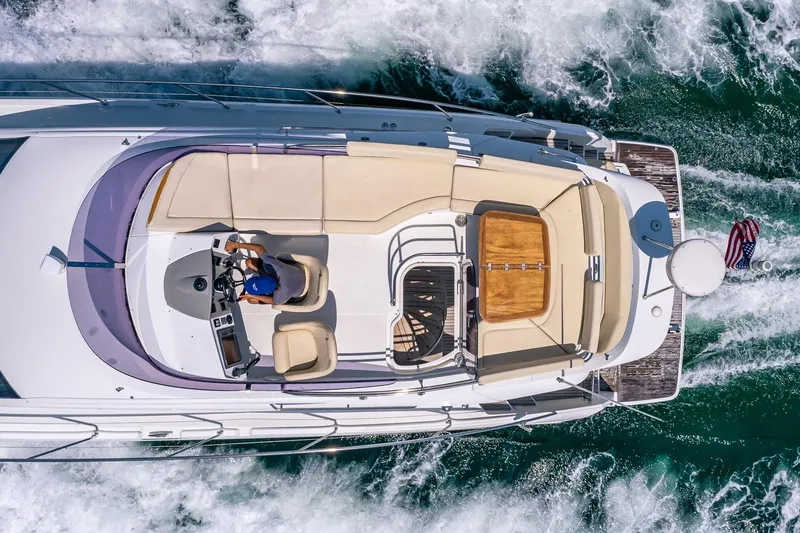 Slide: The Image of Overhead view of 2011 Beneteau Gran Turismo 49 Fly yacht cruising on water. - 40