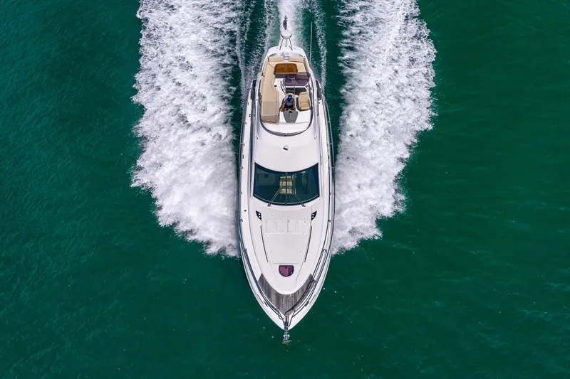 Slide: The Image of Aerial view of 2011 Beneteau Gran Turismo 49 Fly yacht cruising on turquoise water. - 6
