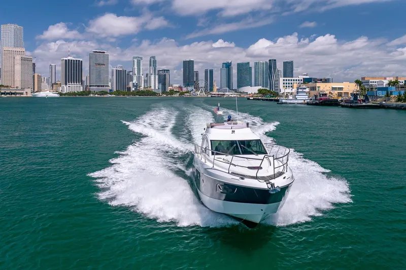 Slide: The Image of Beneteau Gran Turismo 49 Fly cruising near city skyline, 2011 model. - 7