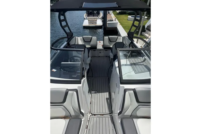 Slide: The Image of 2021 Yamaha Boats 252SD interior with sleek seating and modern design. - 4