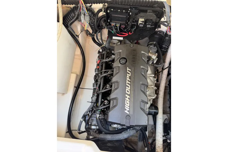 Slide: The Image of 2021 Yamaha Boats 252SD high output engine with visible wiring and components. - 7