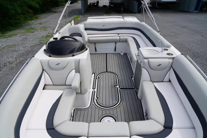 Slide: The Image of 2019 Starcraft Star Step 221 E I/O boat interior with spacious seating and sleek design. - 13
