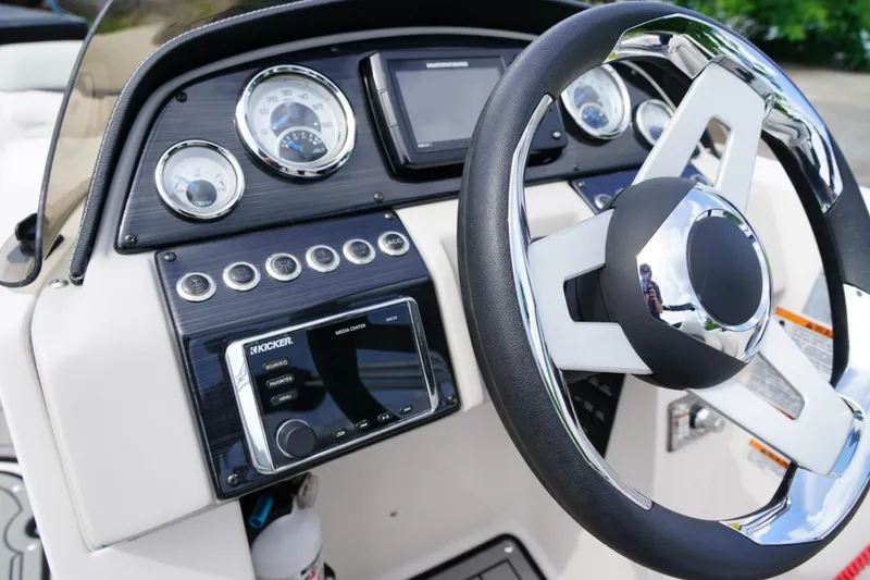 Slide: The Image of 2019 Starcraft Star Step 221 E I/O dashboard with steering wheel and control panel. - 15