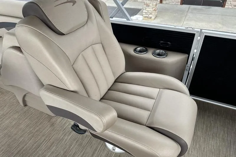 Slide: The Image of Luxurious beige captain's chair in 2022 Bennington 22 SSRX boat interior. - 4