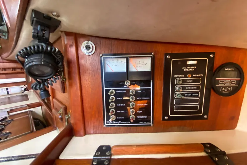 Slide: The Image of Electrical control panel on a 1980 Pacific Seacraft Orion 27 sailboat interior. - 26