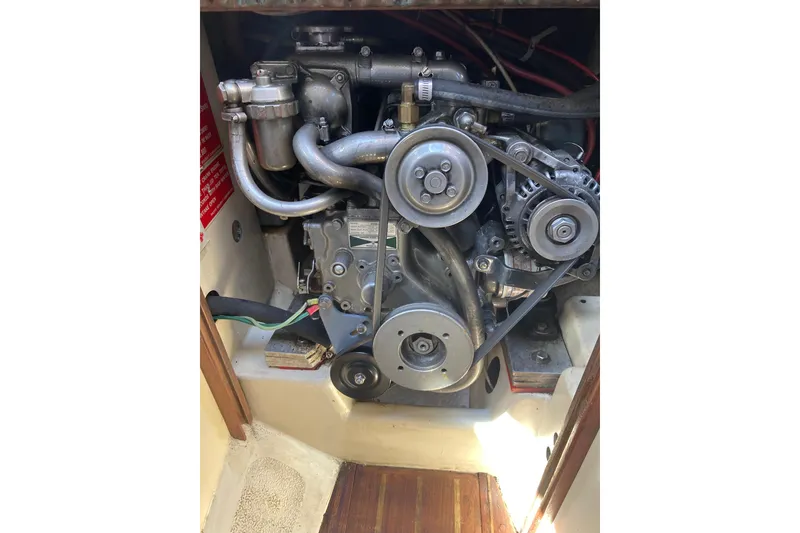 Slide: The Image of Engine compartment of a 1980 Pacific Seacraft Orion 27 sailboat. - 28