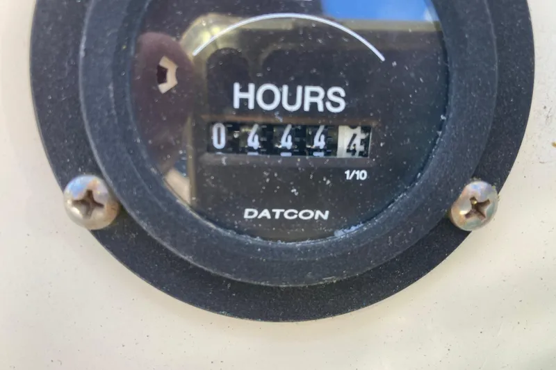 Slide: The Image of Hour meter reading 444.4 on a 1980 Pacific Seacraft Orion 27 boat. - 29