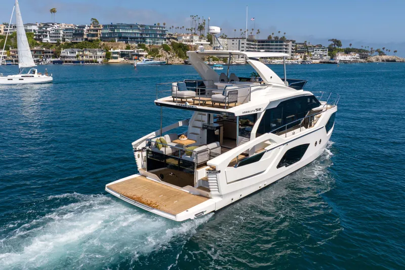 Slide: The Image of Luxury yacht Absolute 52 Fly 2026 cruising in scenic coastal waters. - 64