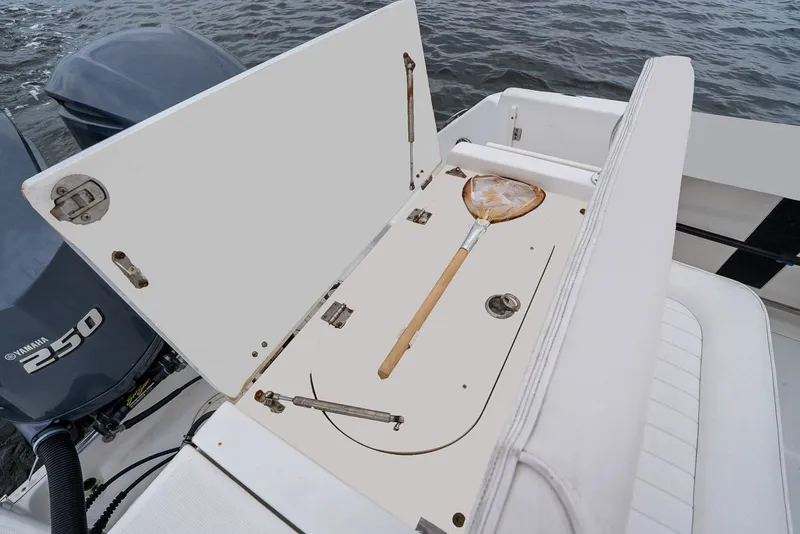 Slide: The Image of 2013 Robalo R260 Center Console with storage and Yamaha 250 engine. - 14