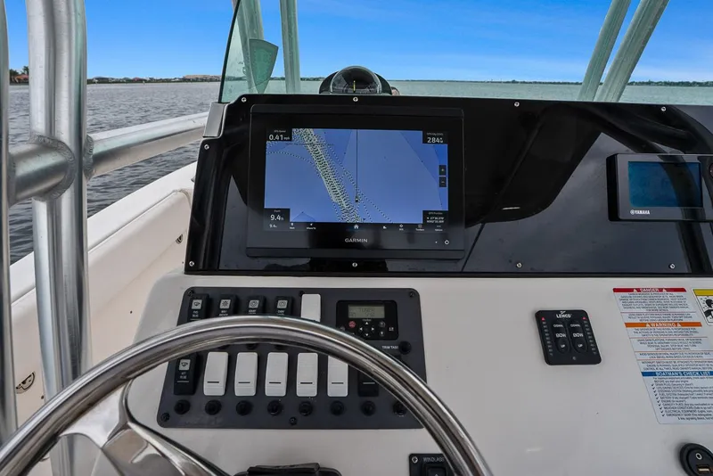 Slide: The Image of Dashboard of 2013 Robalo R260 Center Console boat. - 25