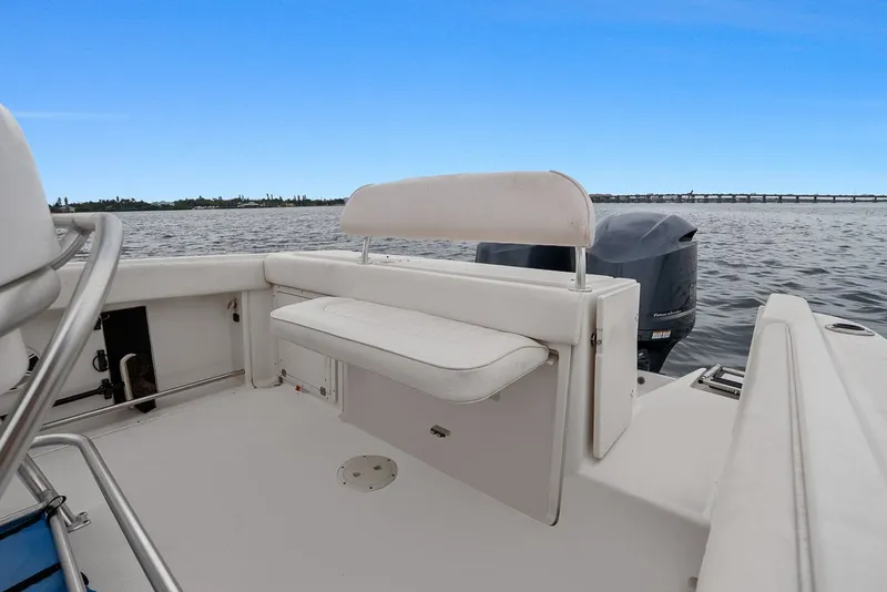 Slide: The Image of 2013 Robalo R260 Center Console on calm waters. - 26