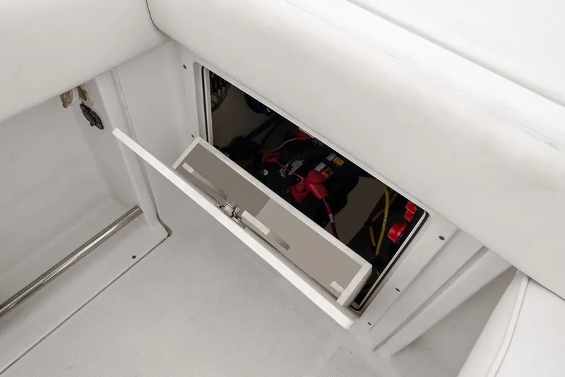 Slide: The Image of Battery compartment of 2013 Robalo R260 Center Console. - 37