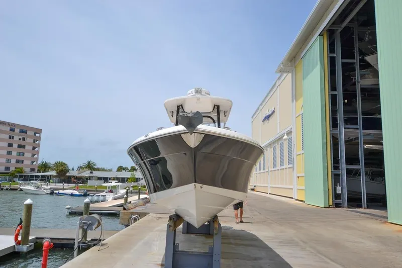 Slide: The Image of 2013 Robalo R260 Center Console boat in dry dock. - 7